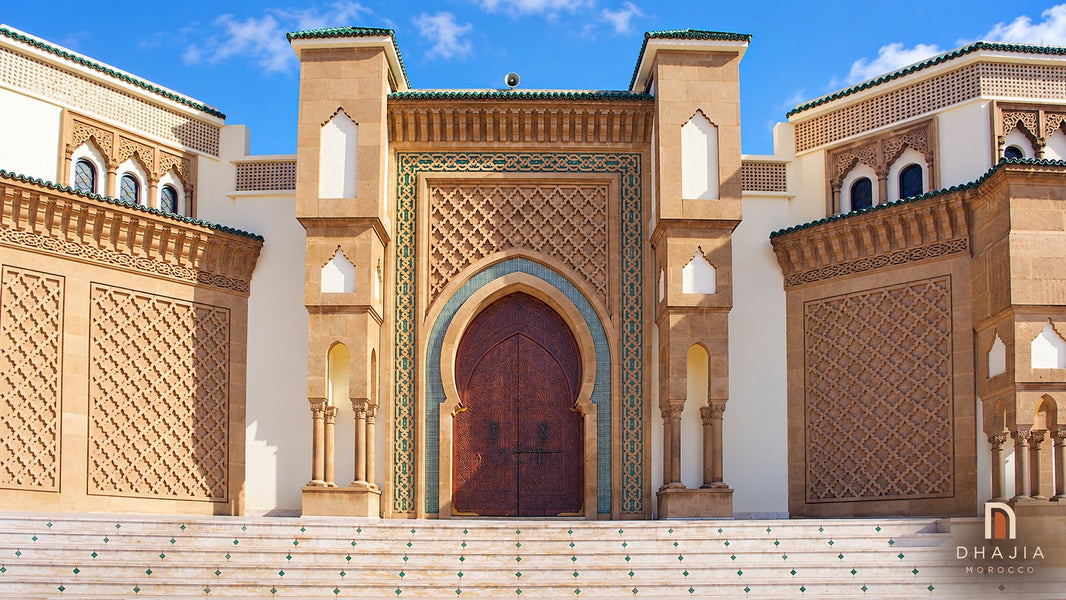 Carved entrance and green tiled details of Mohammed V Mosque in Talborjt, Agadir, with DHAJIA Morocco branding.