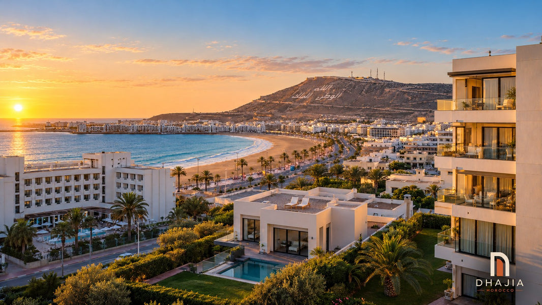 Editorial illustration of holiday accommodation overlooking an Agadir-inspired bay, beachfront and Oufella hillside at sunset.