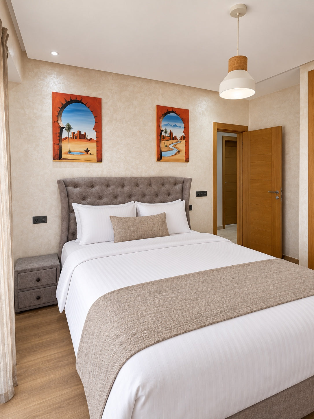 Bedrooms | Close bedroom view with hotel-style white bedding and Moroccan wall art