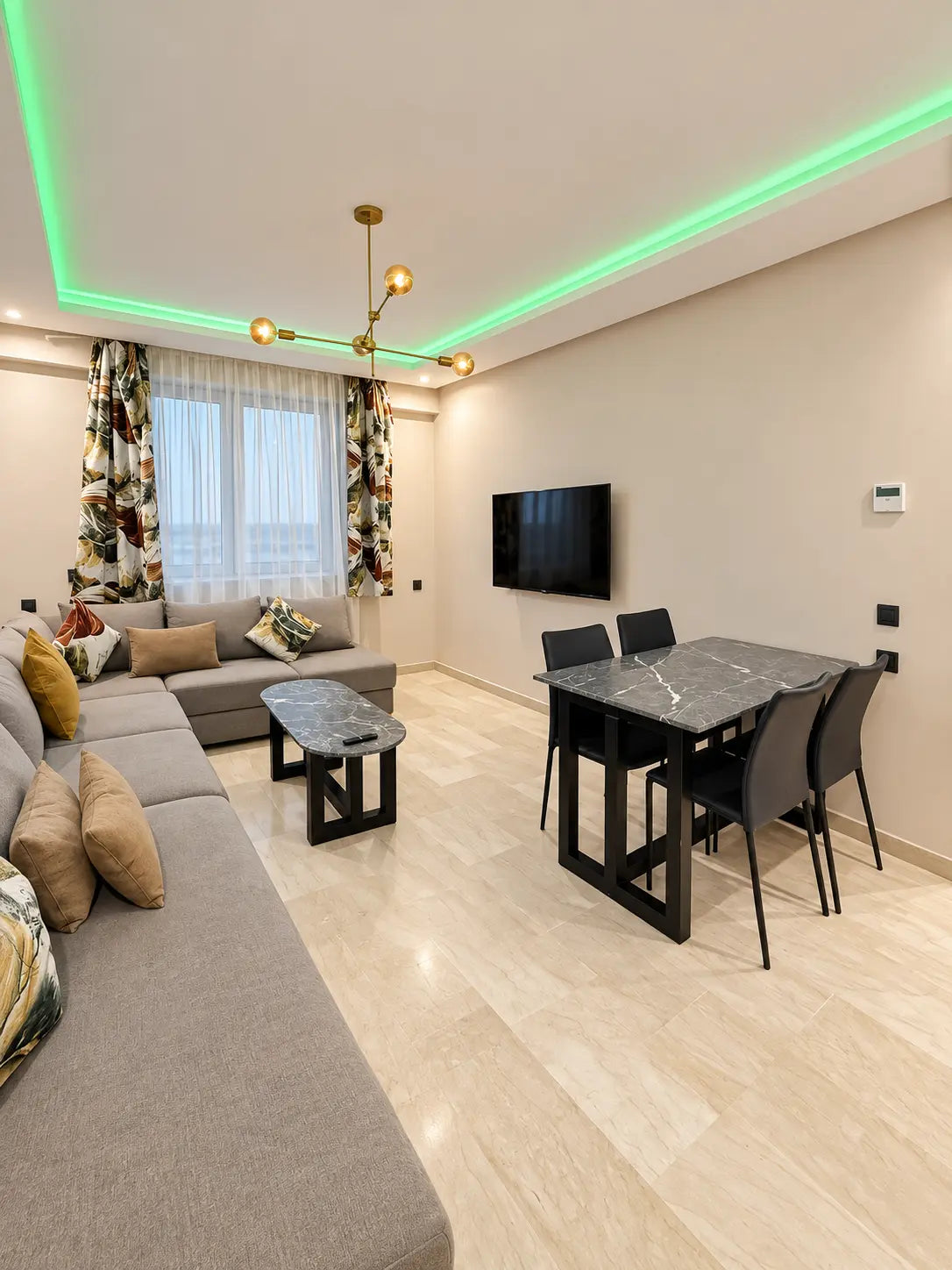 Living room | TV and dining area with generous seating for guests