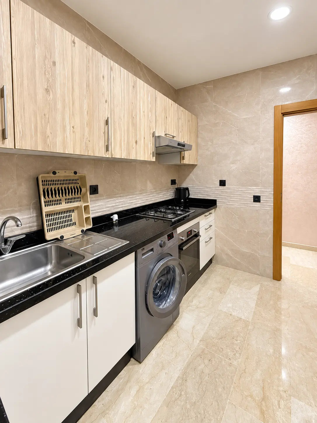 Kitchen | Kitchen sink side view and fitted worktop area
