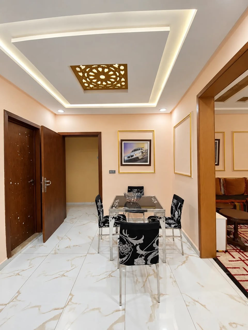 Dining area with decorative gold ceiling