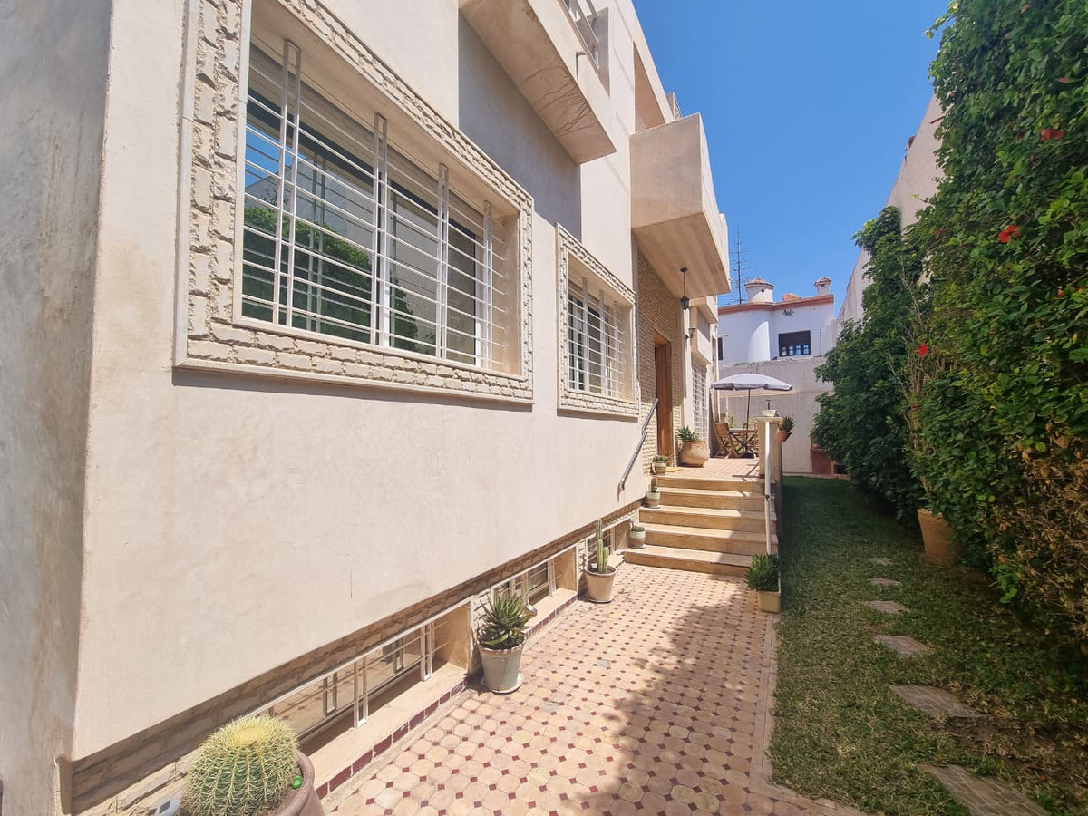 Villa exterior and side path — Dakhla Bloc F1 villa, Agadir