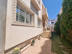 Villa exterior and side path — Dakhla Bloc F1 villa, Agadir