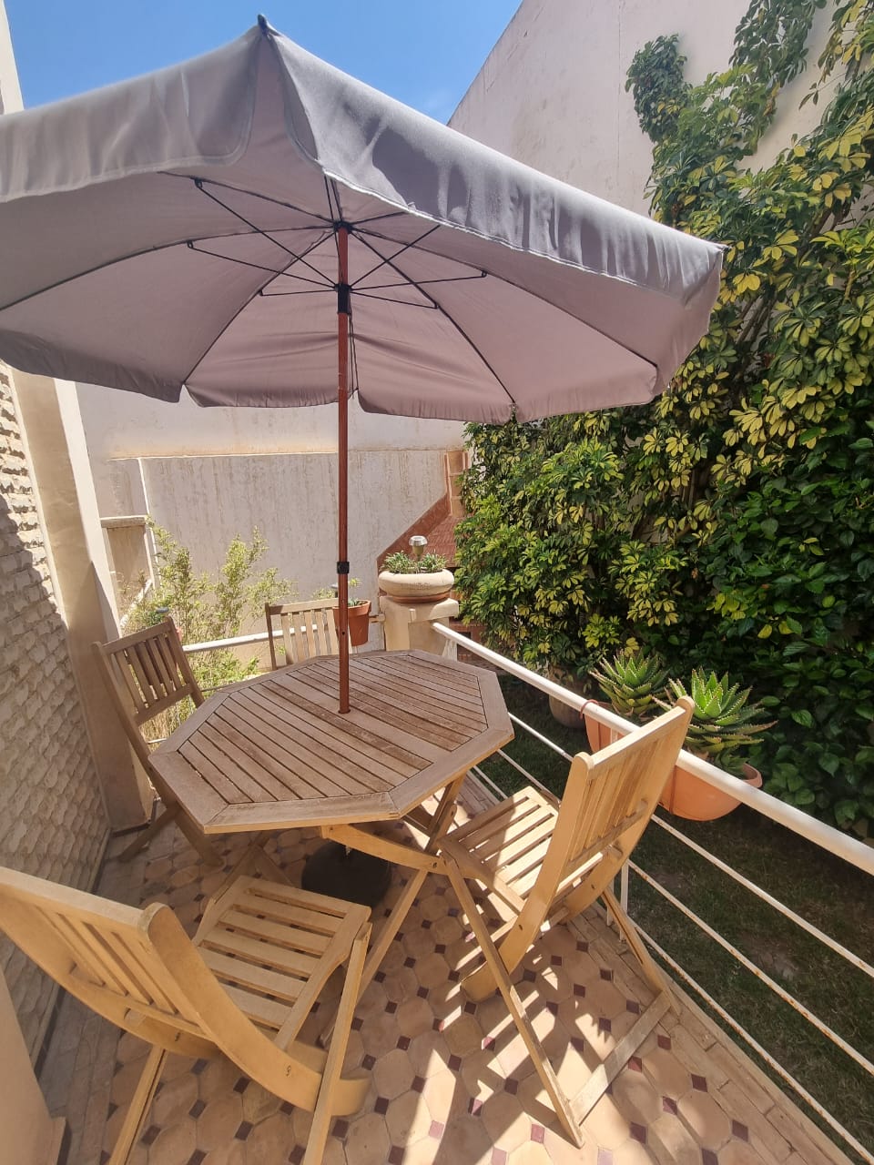 Outdoor dining table — Dakhla Bloc F1 villa, Agadir