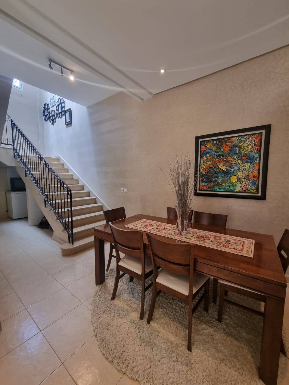 Dining space beside staircase — Dakhla Bloc F1 villa, Agadir