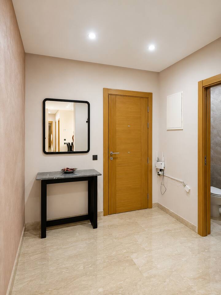 Entrance hall with console table in the Agadir Bay apartment.