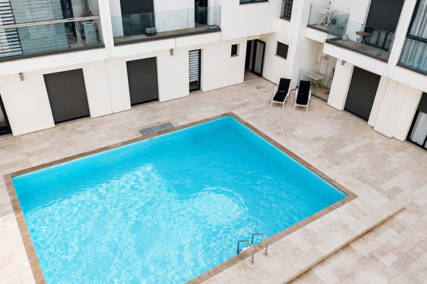 View of the communal swimming pool from the Agadir Bay apartment residence.