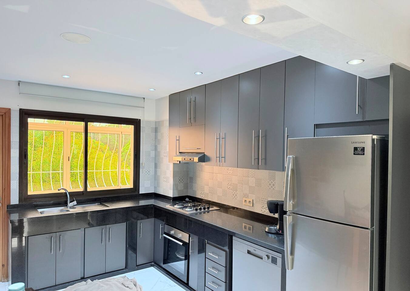 Kitchen worktops and window in the central Agadir apartment.