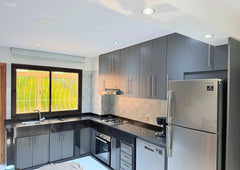 Kitchen worktops and window in the central Agadir apartment.