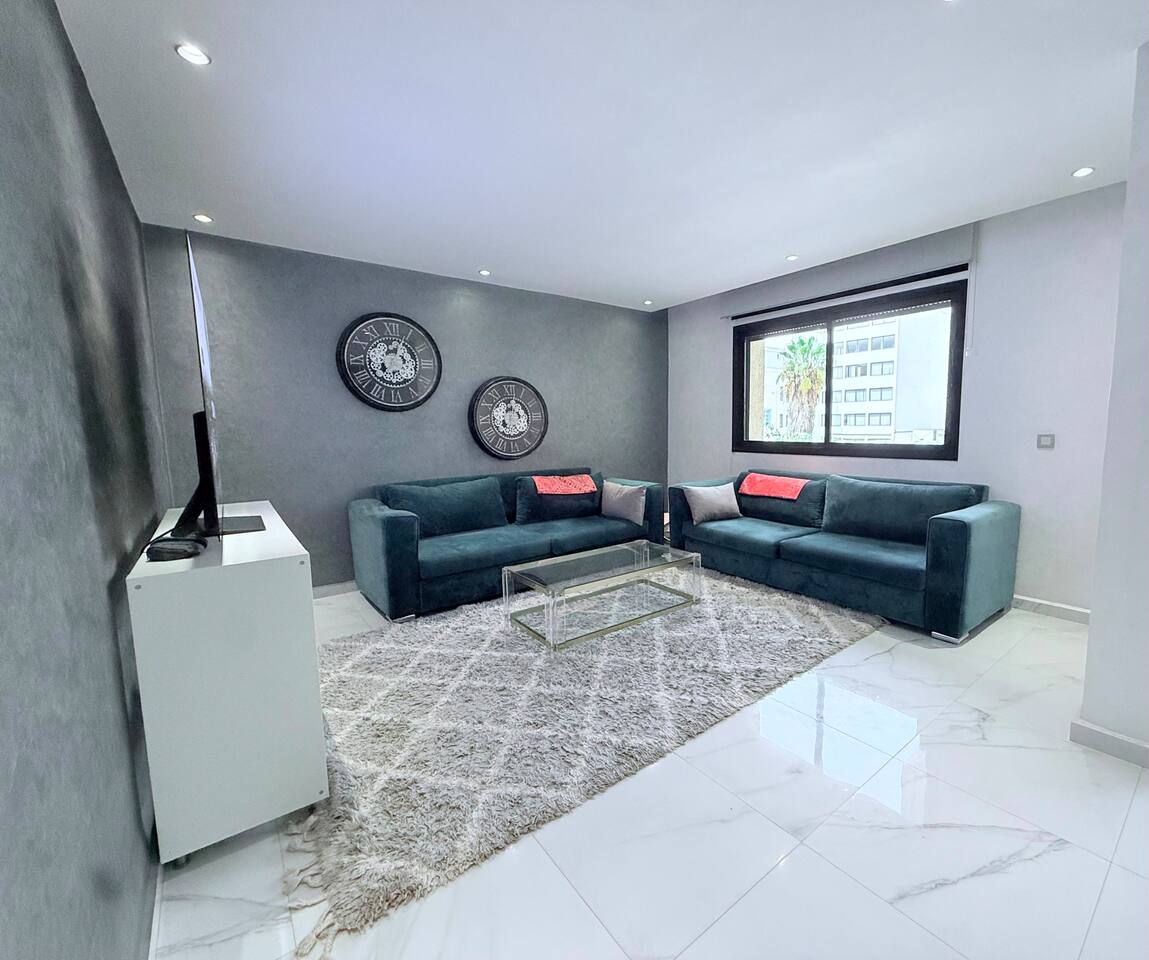 Entrance view into the spacious living room in the central Agadir apartment.