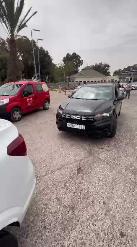 Grey Dacia Logan available through DHAJIA Morocco car hire in Agadir