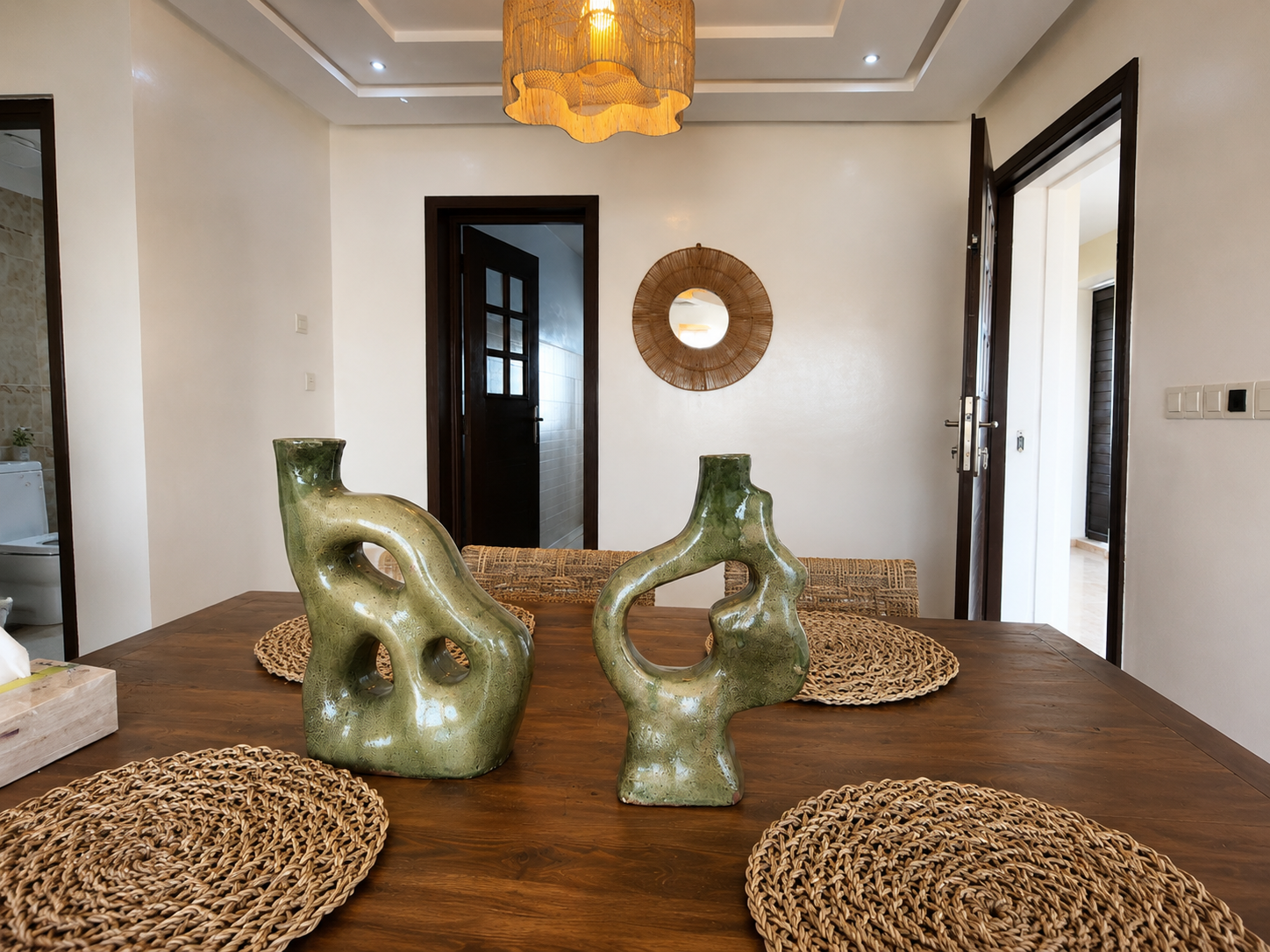 Dining table with decorative place settings in the Haut Founty apartment.