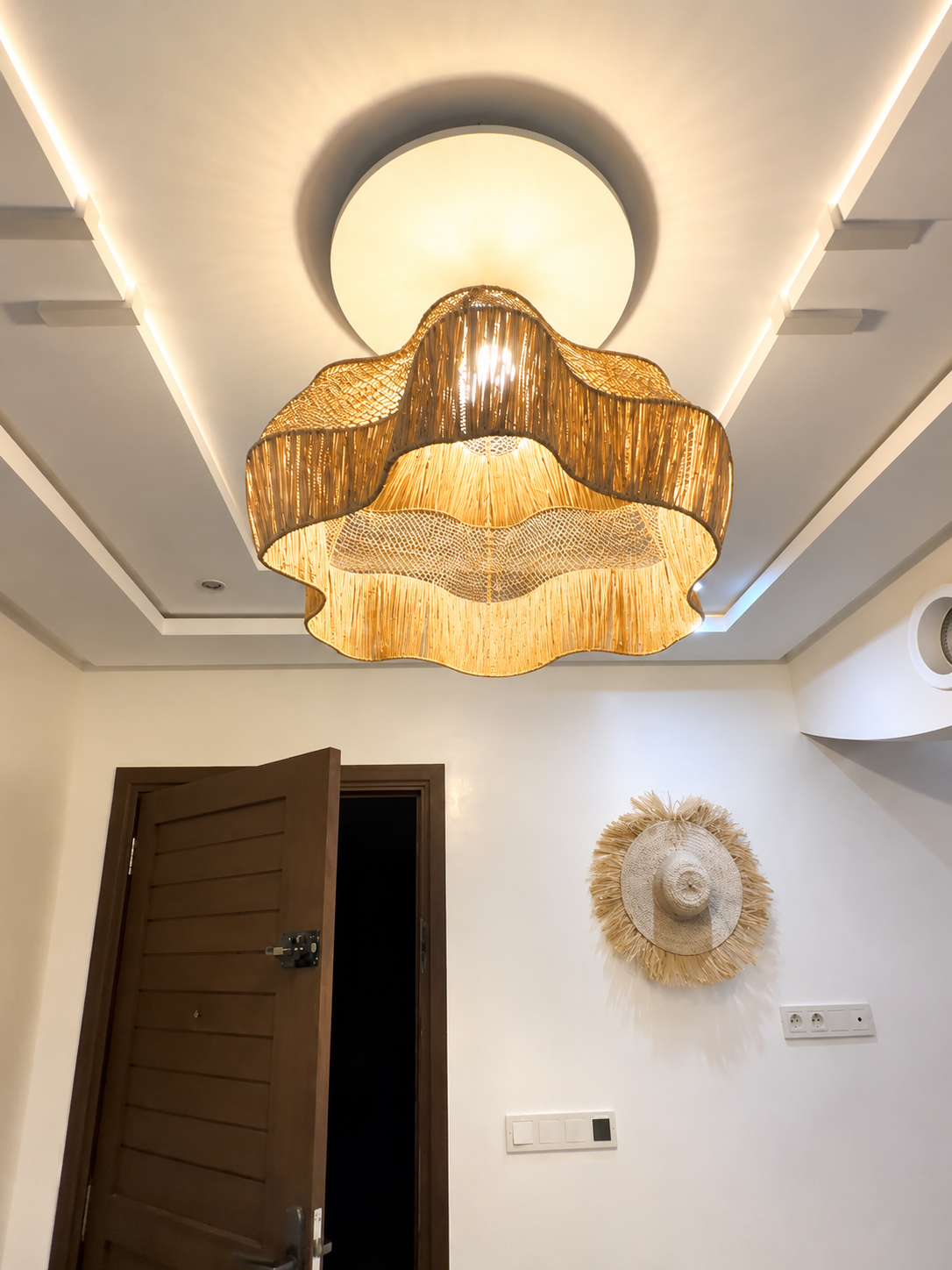Moroccan-inspired woven pendant lights in the Haut Founty apartment.