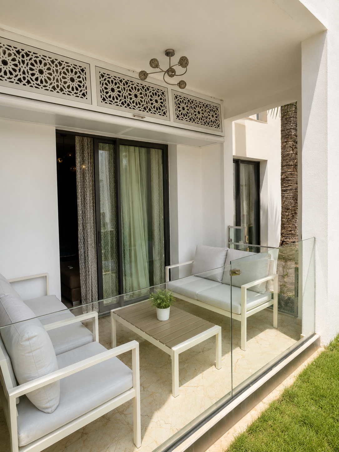 Sheltered balcony seating area at the Hivernage Agadir Bay apartment.