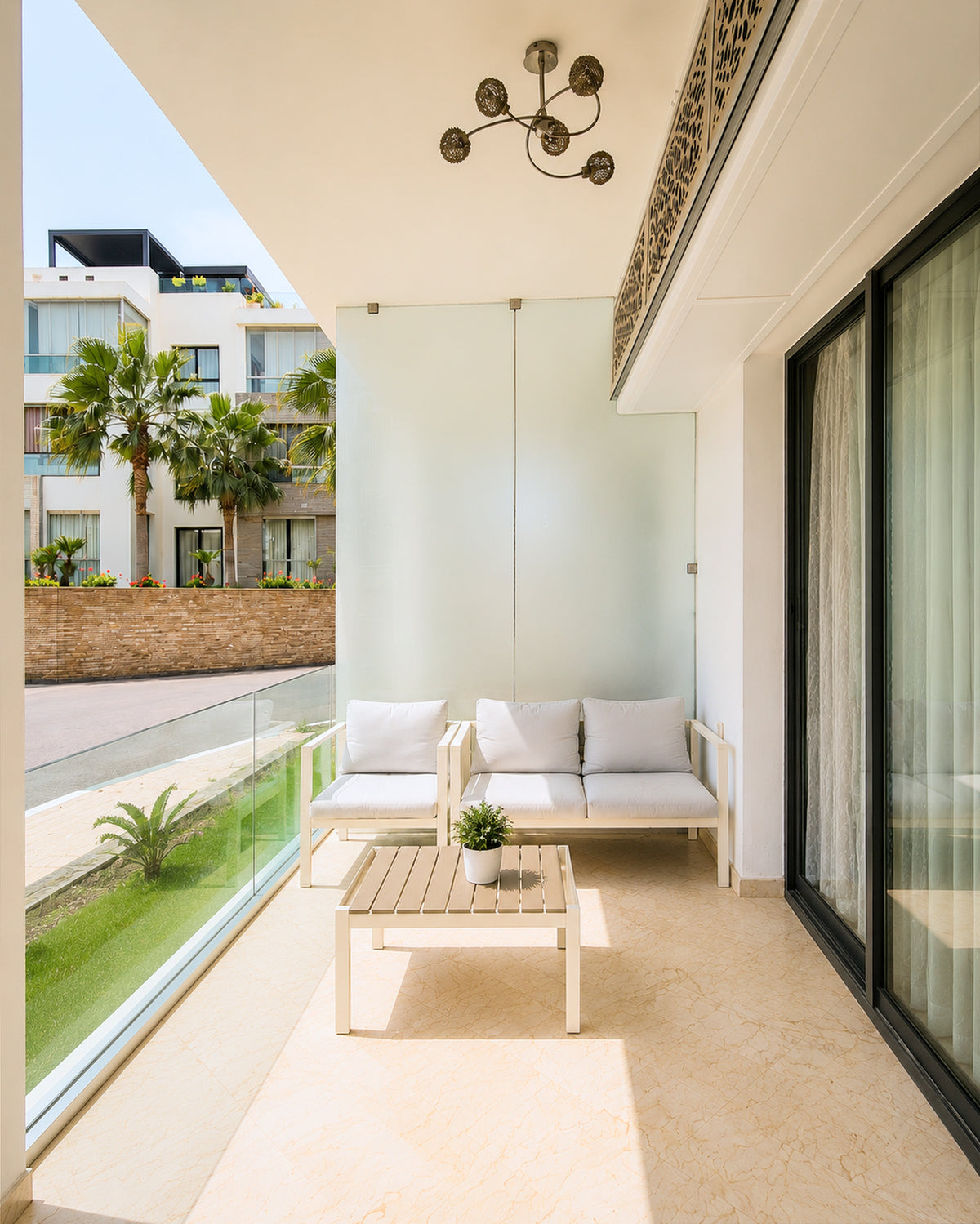 Outdoor terrace seating at the Hivernage Agadir Bay apartment