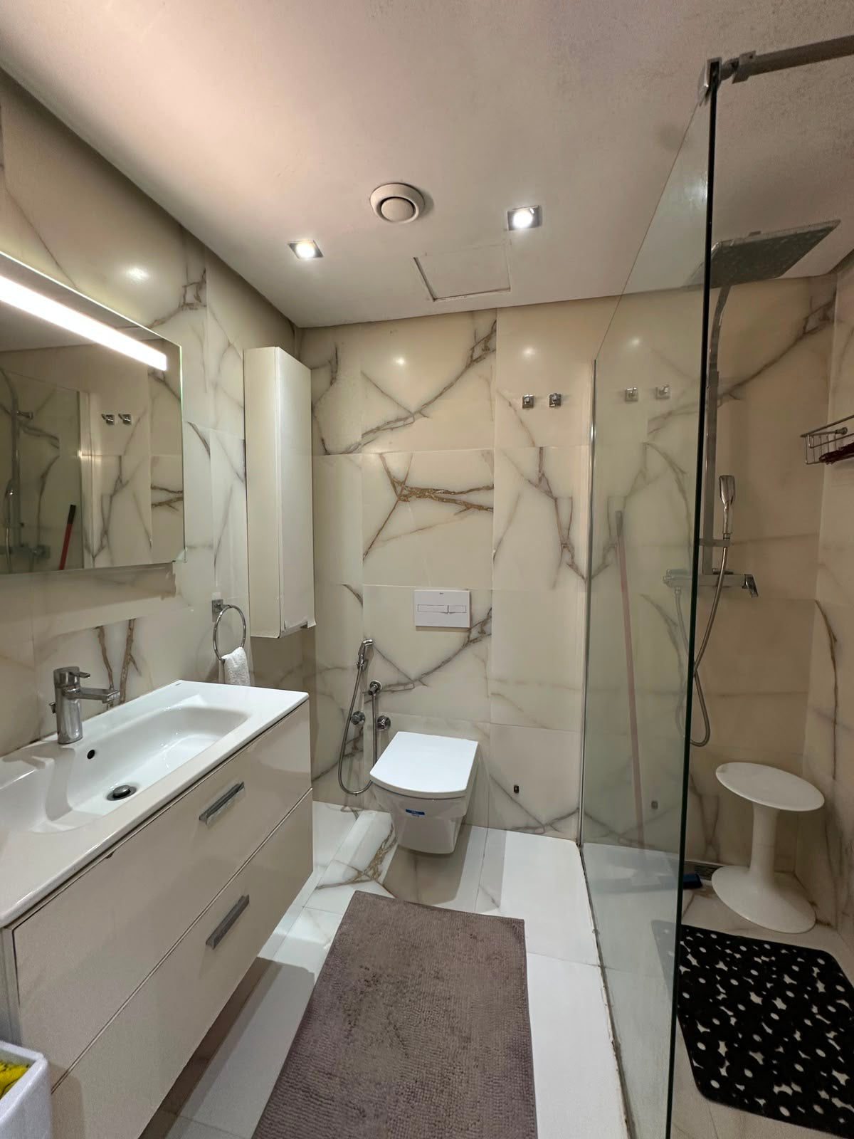 Bathroom vanity and walk-in shower in the Iken Gardens apartment in Agadir Bay.
