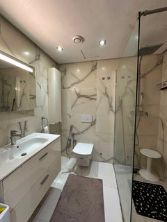 Bathroom vanity and walk-in shower in the Iken Gardens apartment in Agadir Bay.