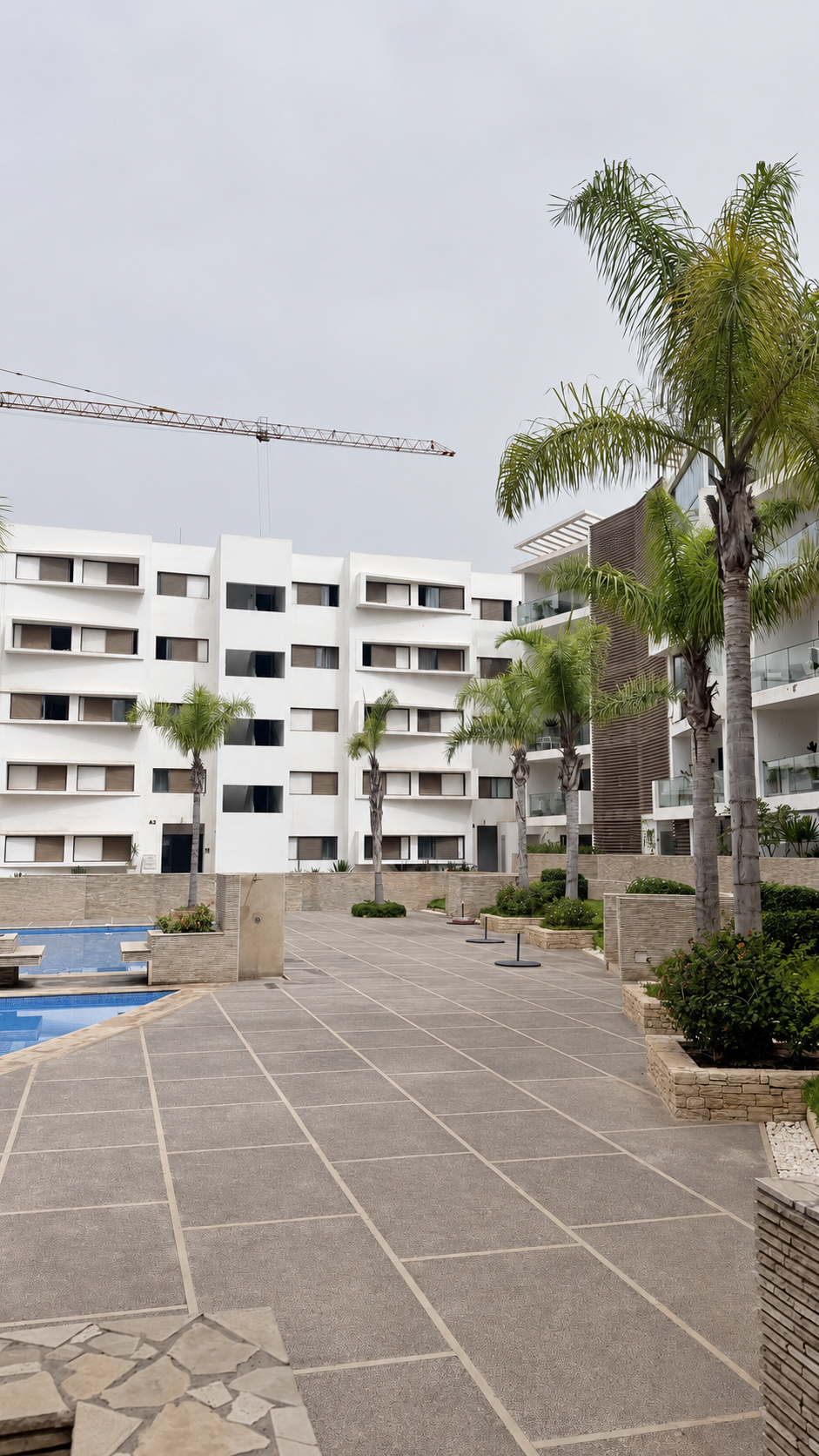 Pool and apartment buildings at the Iken Gardens holiday apartment, Agadir Bay