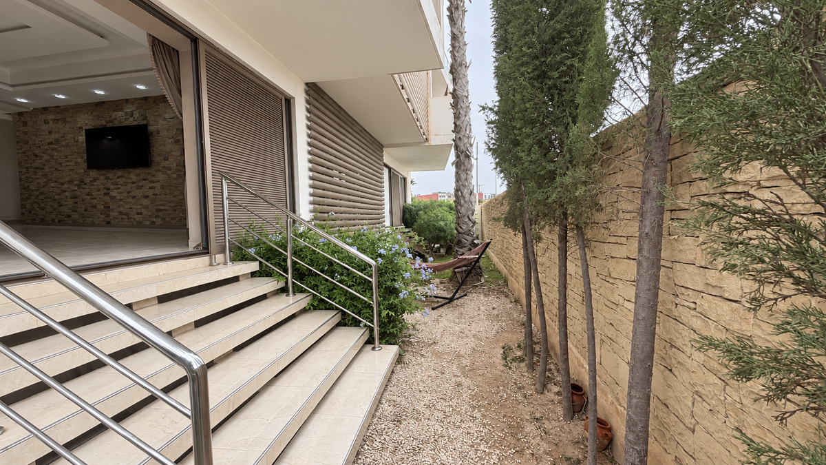Garden beside apartment terrace at the Iken Gardens holiday apartment, Agadir Bay