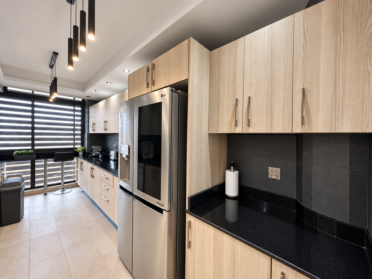 Kitchen cabinets and oven at the Iken Gardens holiday apartment, Agadir Bay