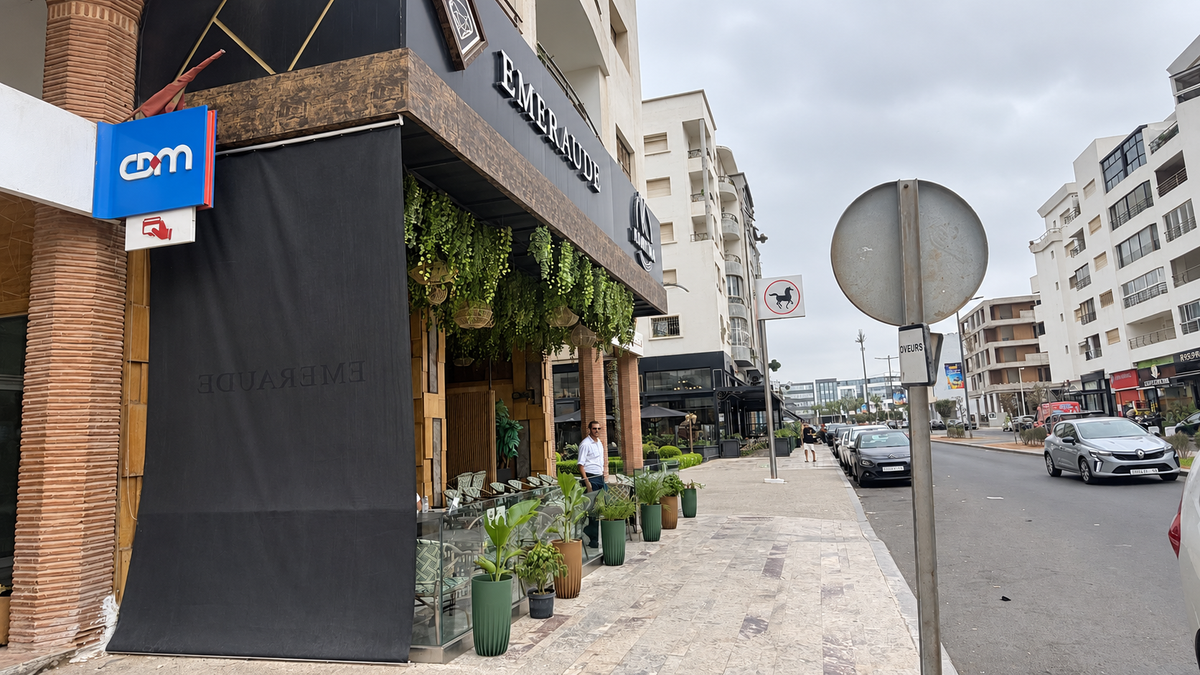 Street and shops near Iken Gardens residence at the Iken Gardens holiday apartment, Agadir Bay