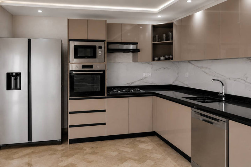 Corner view of the premium apartment kitchen and integrated appliances.