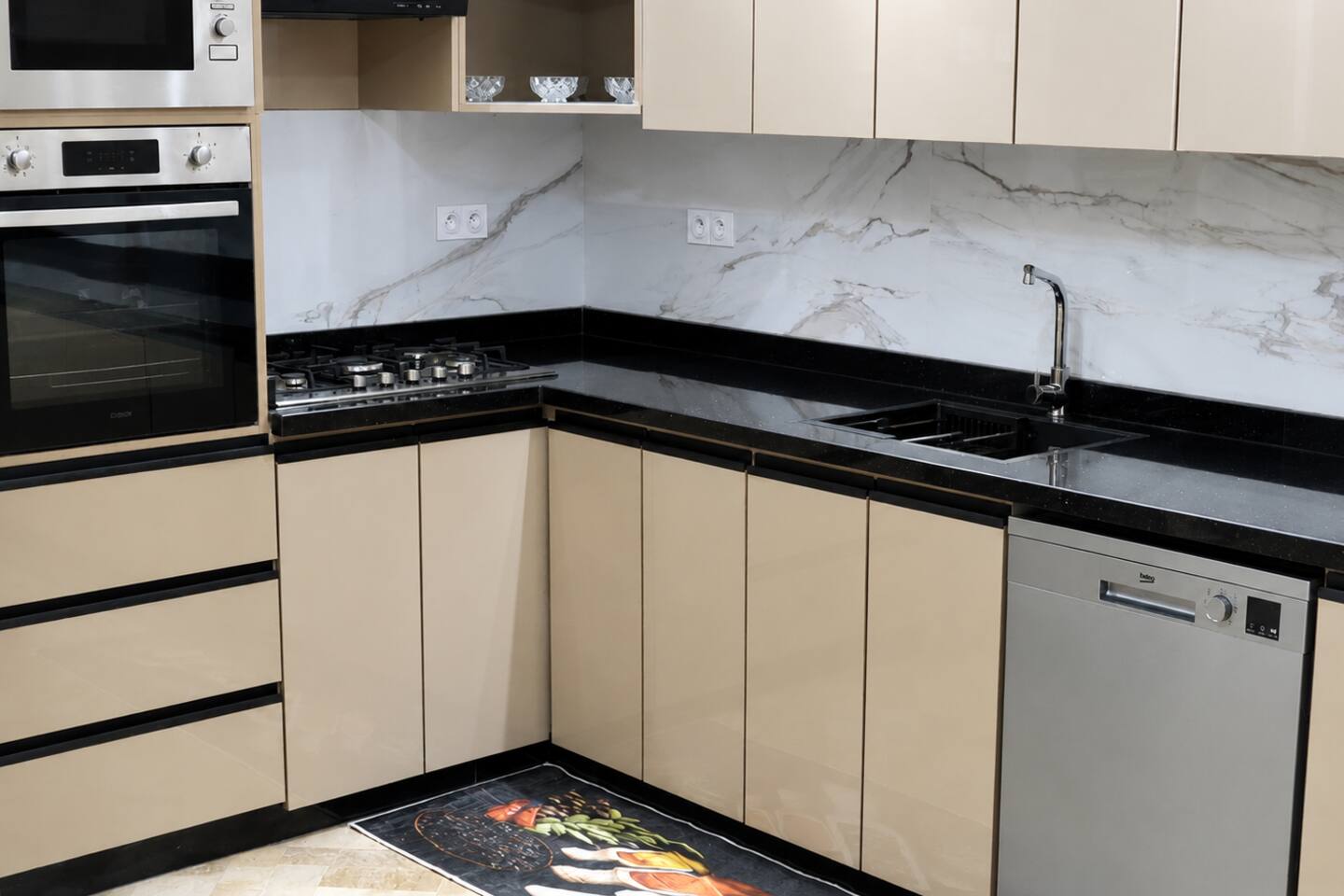Kitchen sink, worktop and dishwasher in the premium apartment near Agadir Bay.