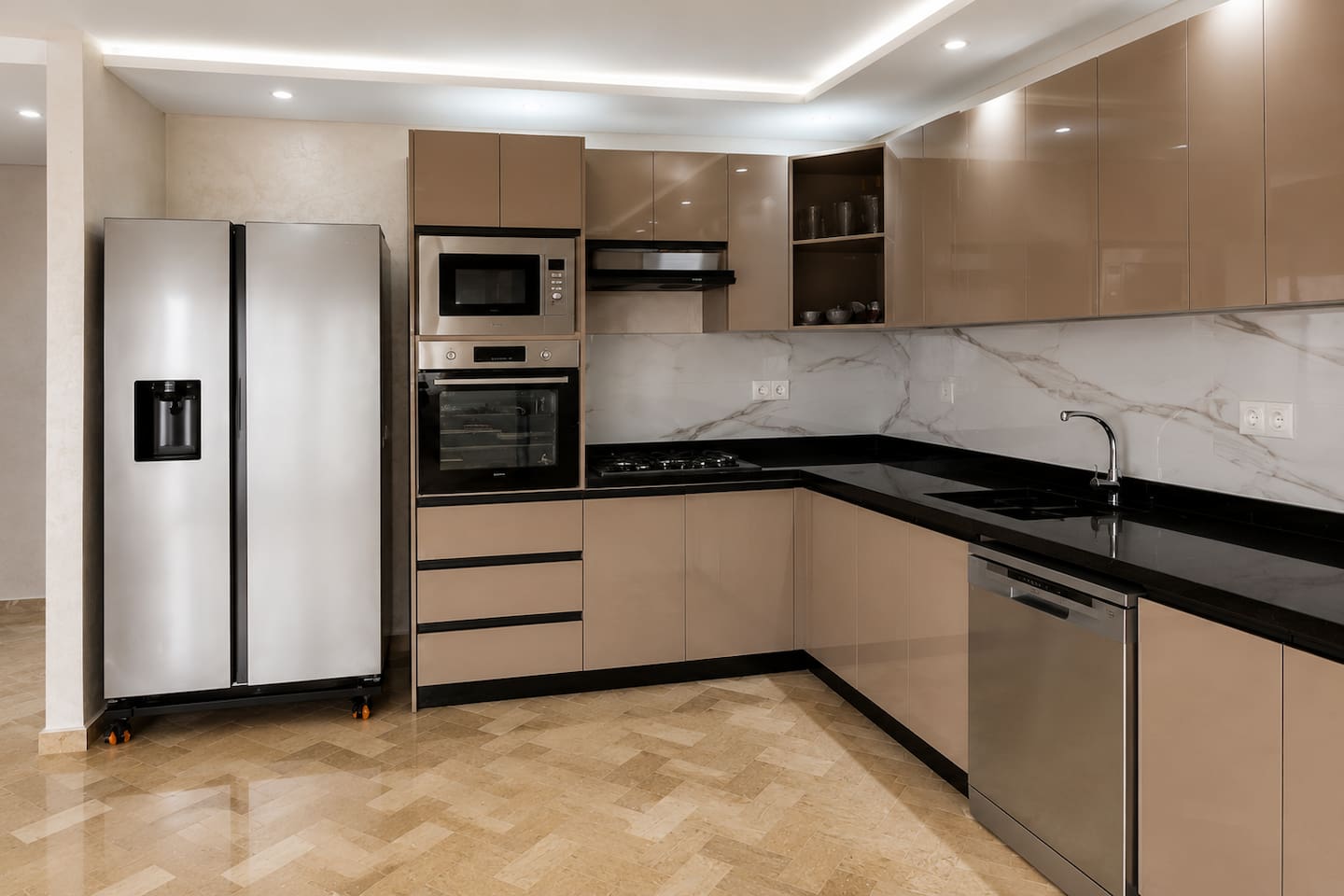 Wide view of the fitted kitchen and integrated appliances near Agadir Bay.