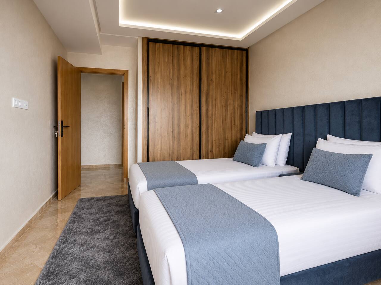 Twin bedroom viewed from the doorway in the premium apartment near Agadir Bay.
