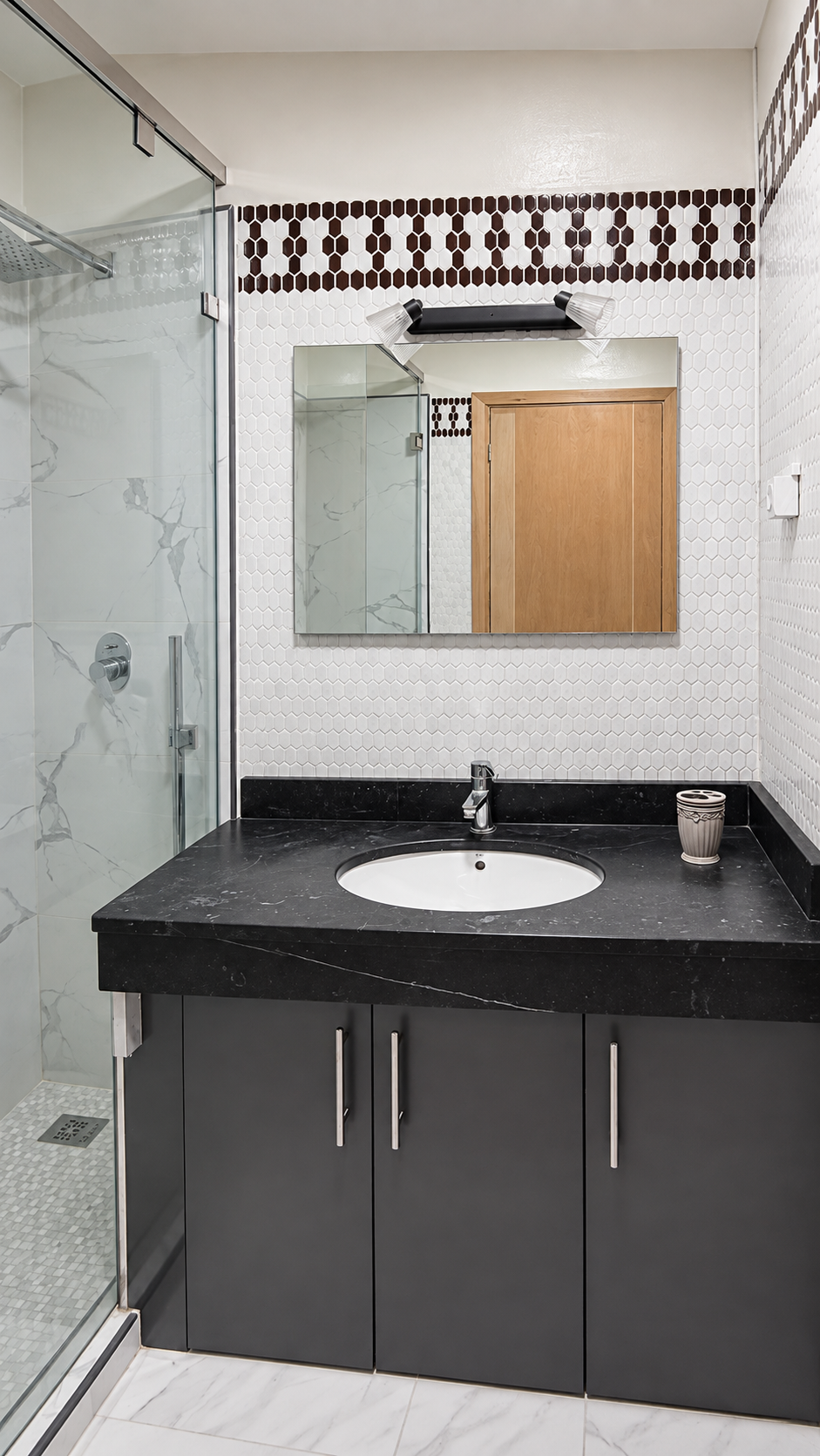 Bathroom vanity and mirror at the Central Agadir holiday apartment near the beach and souk