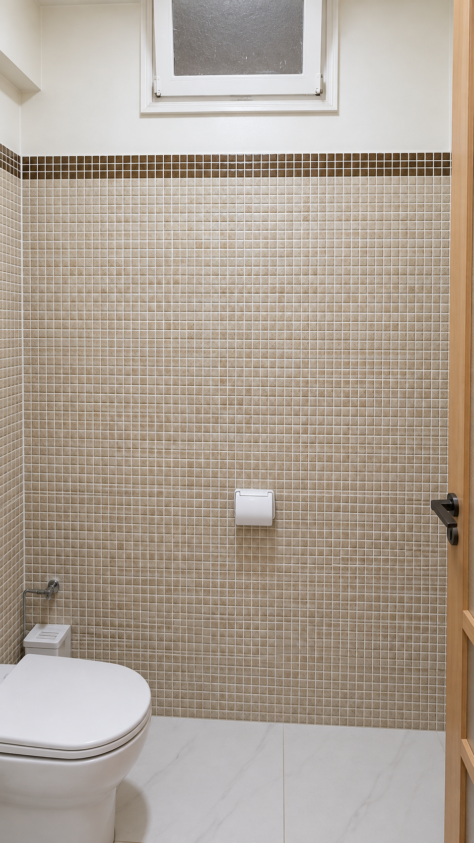 Bathroom toilet and tiled wall at the Central Agadir holiday apartment near the beach and souk