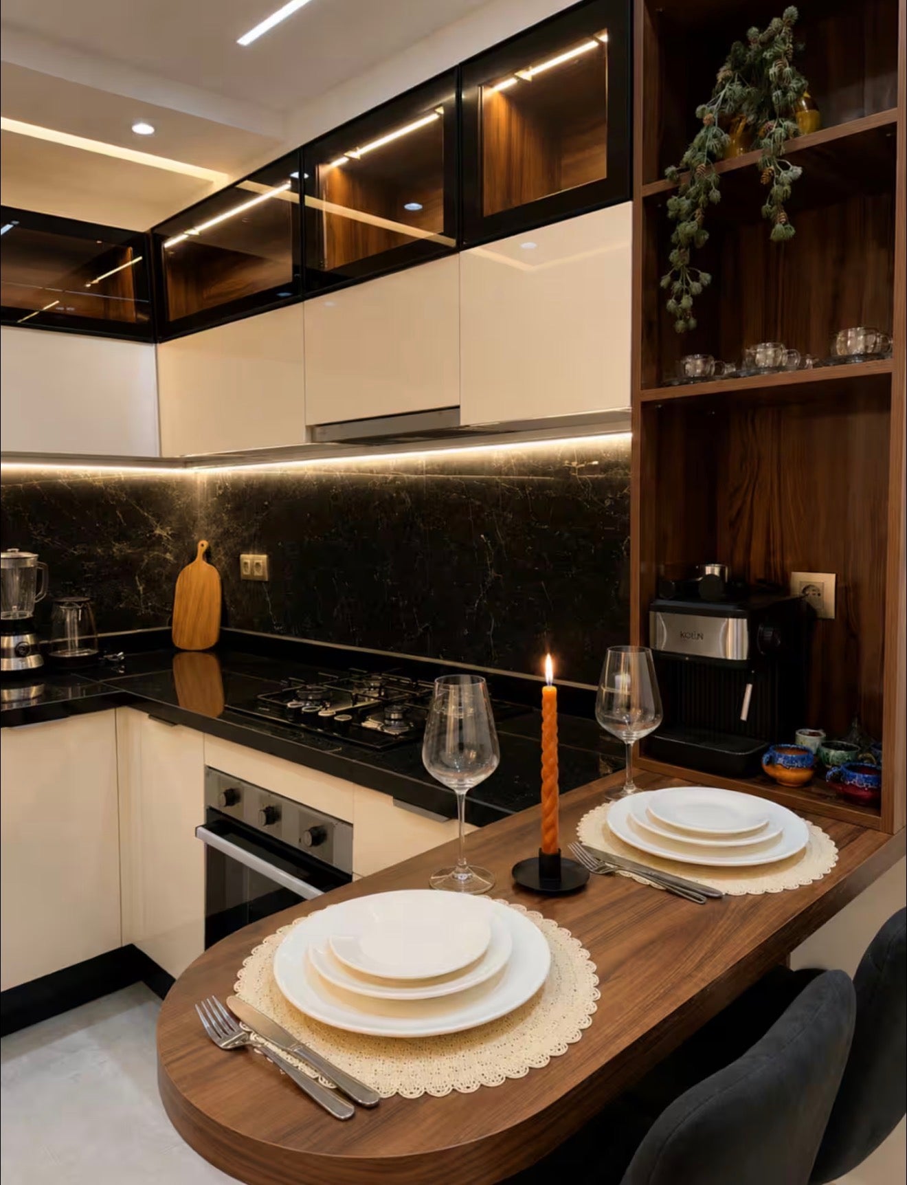 Fitted kitchen in DHAJIA Tilila, Agadir apartment with dining setup and modern guest facilities.