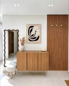Hallway console and mirror in DHAJIA Tilila, Agadir apartment with clean designer styling.