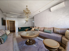 Moroccan salon with chandelier and seating — Résidence Elkatani, Les Jardins d’Agadir, 79 m²