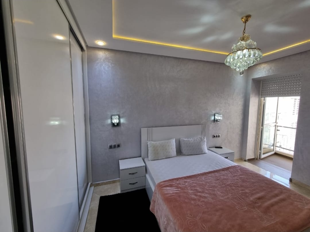 Bedroom with balcony access — Résidence Elkatani, Les Jardins d’Agadir, 79 m²