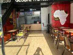 Peri Peri Grill ground-floor dining area with tables and service counter, Agadir Bay