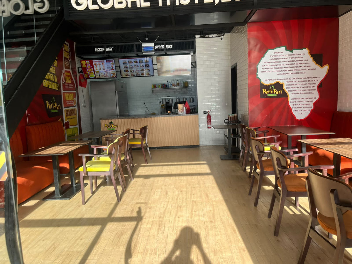 Restaurant dining room and ordering counter at Peri Peri Grill in Agadir Bay