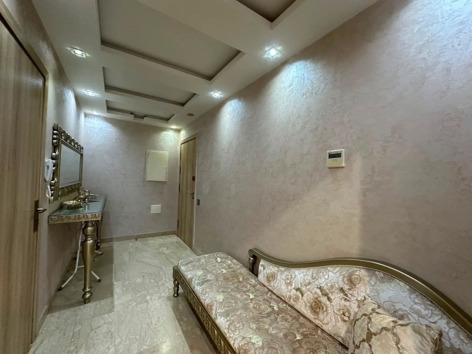 Designer hallway and traditional seating in the Iken Gardens apartment, Agadir Bay.