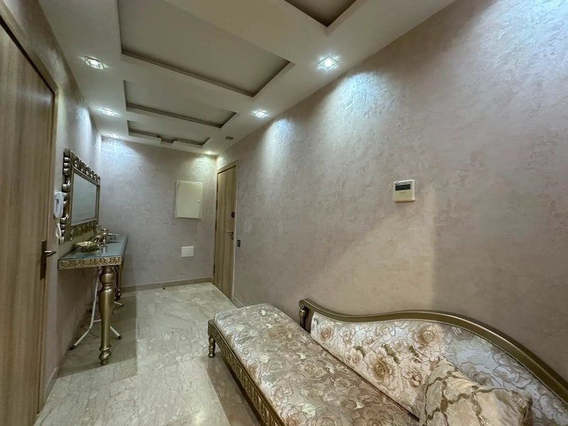 Designer hallway and traditional seating in the Iken Gardens apartment, Agadir Bay.