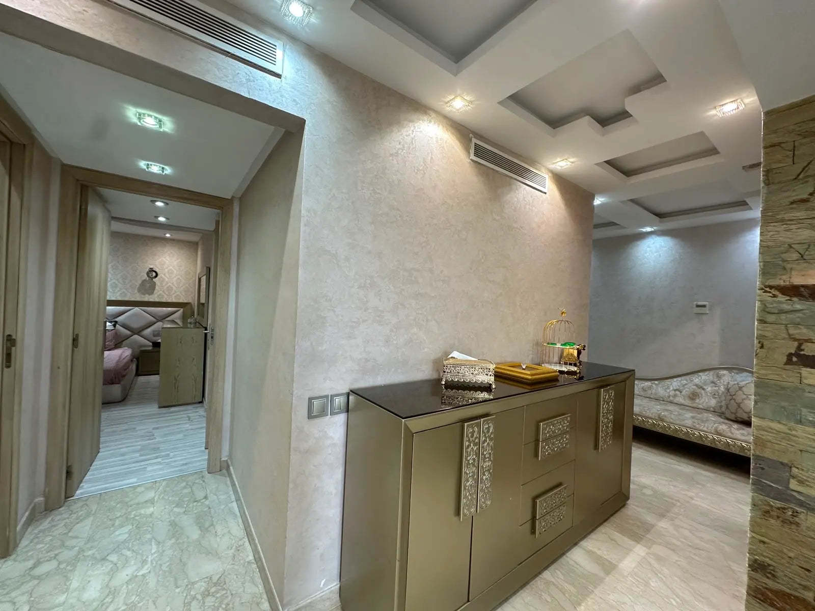 Interior hallway connecting the bedrooms and living area at Iken Gardens, Agadir Bay.