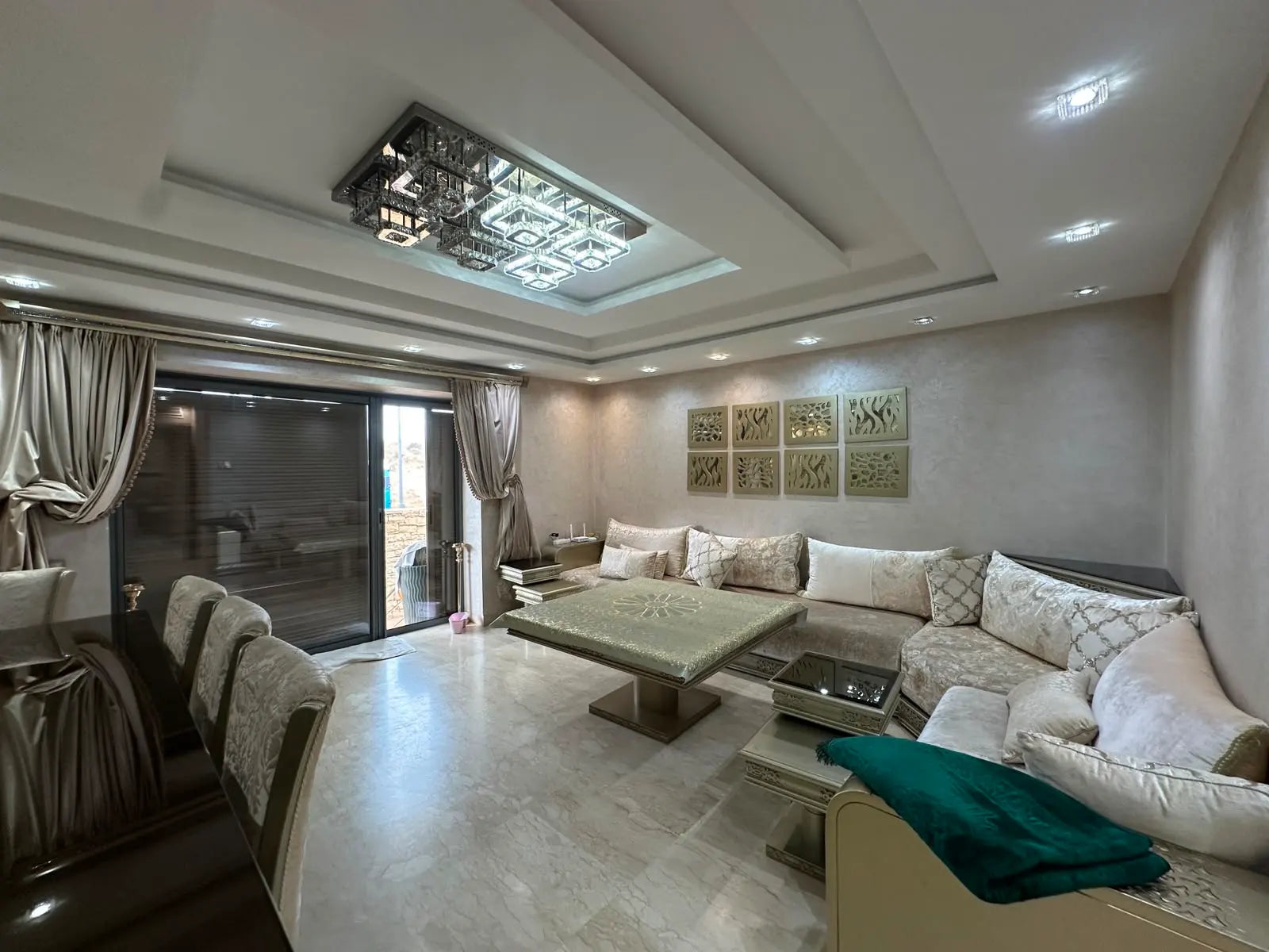 Elegant lounge opening directly onto the private garden at Iken Gardens, Agadir Bay.